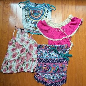 Colorful cache of tops